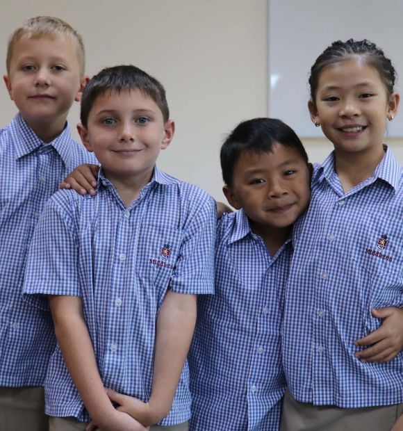 bus-page students smiling at camera