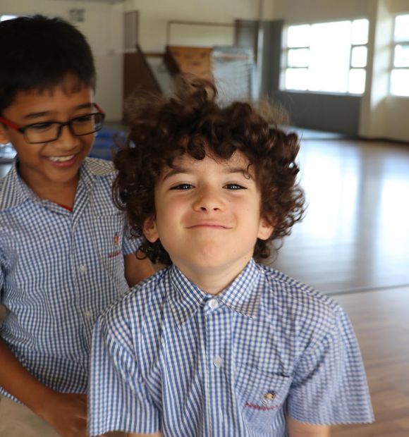 student-pass Children smiling at camera